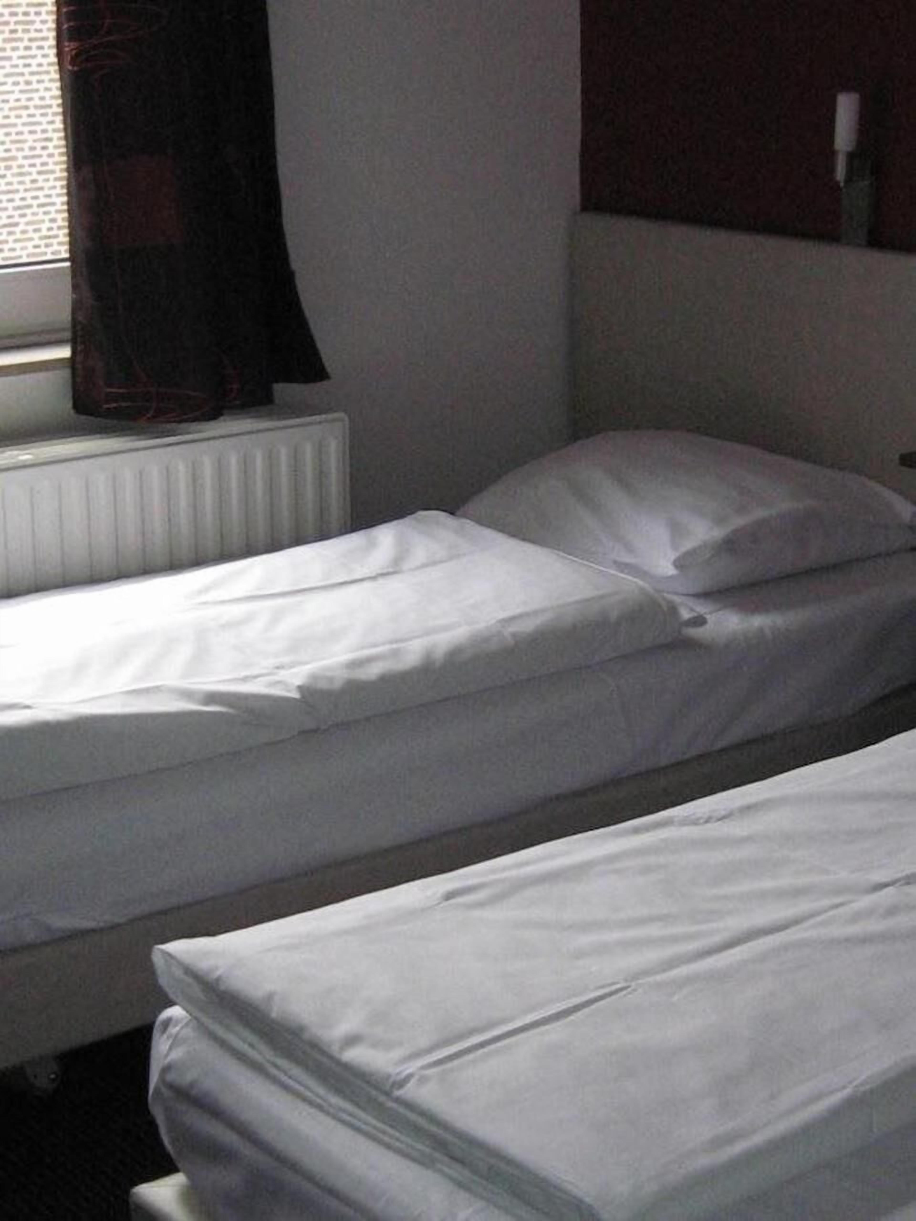 Tweepersoonskamer met 2 Aparte Bedden